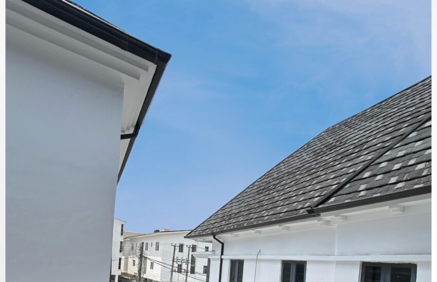 a building with a glass railing in Osapa Lekki